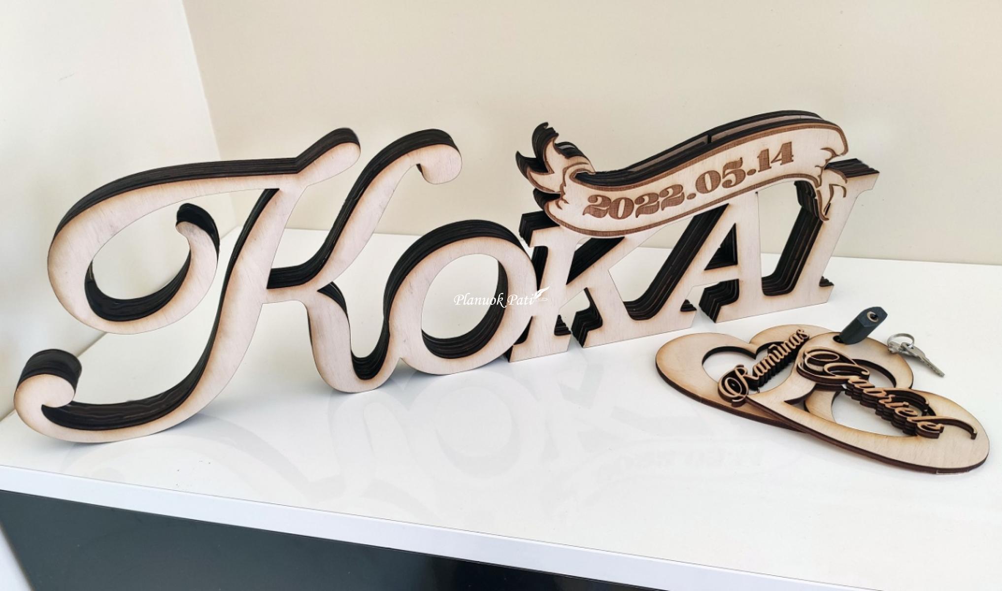 Pastatomas užrašas su surakintomis širdimis