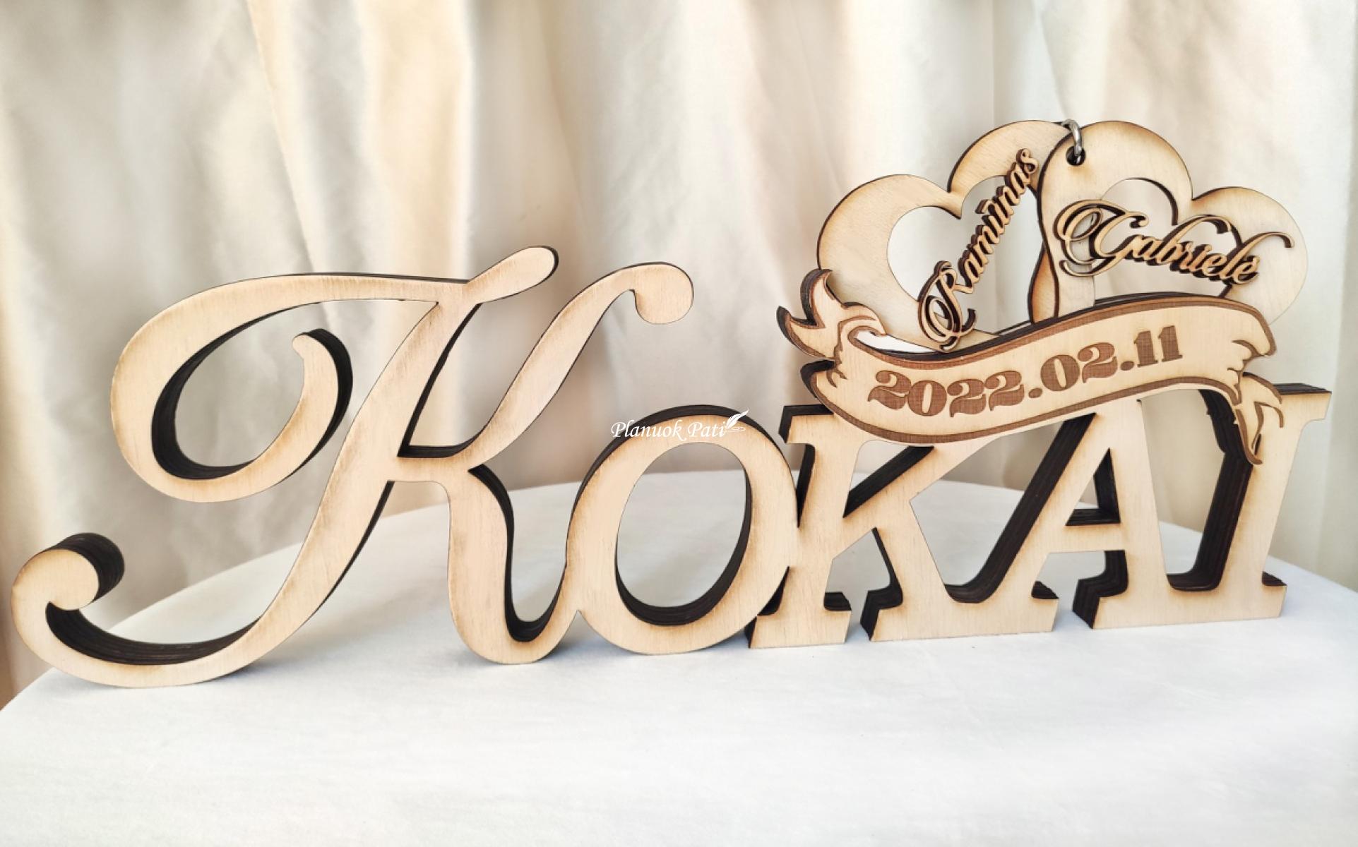 Pastatomas užrašas su surakintomis širdimis