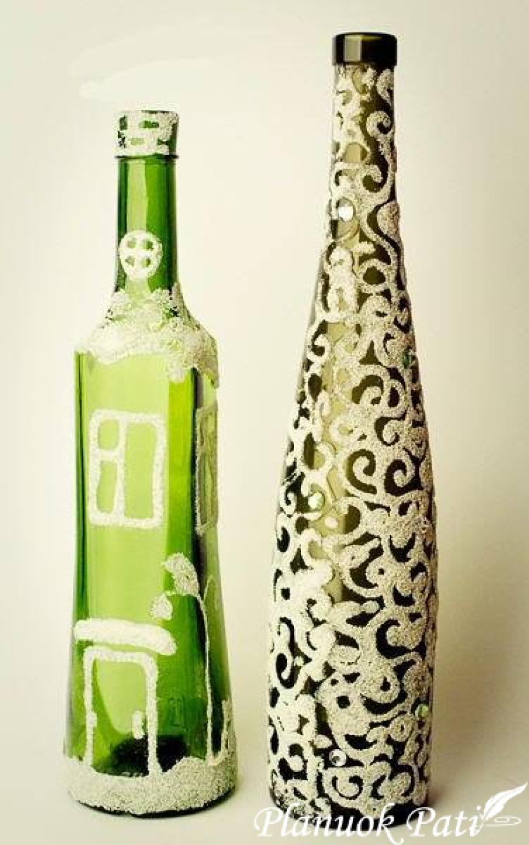 Buteliai, dekoruoti manų kruopomis