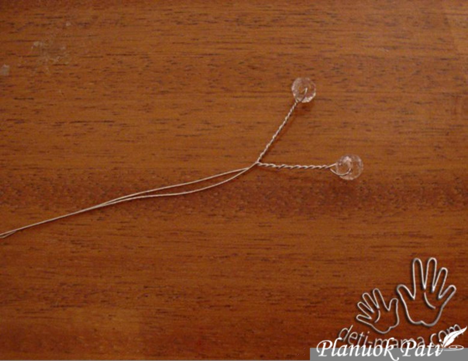 Drugelis iš kaspinėlio