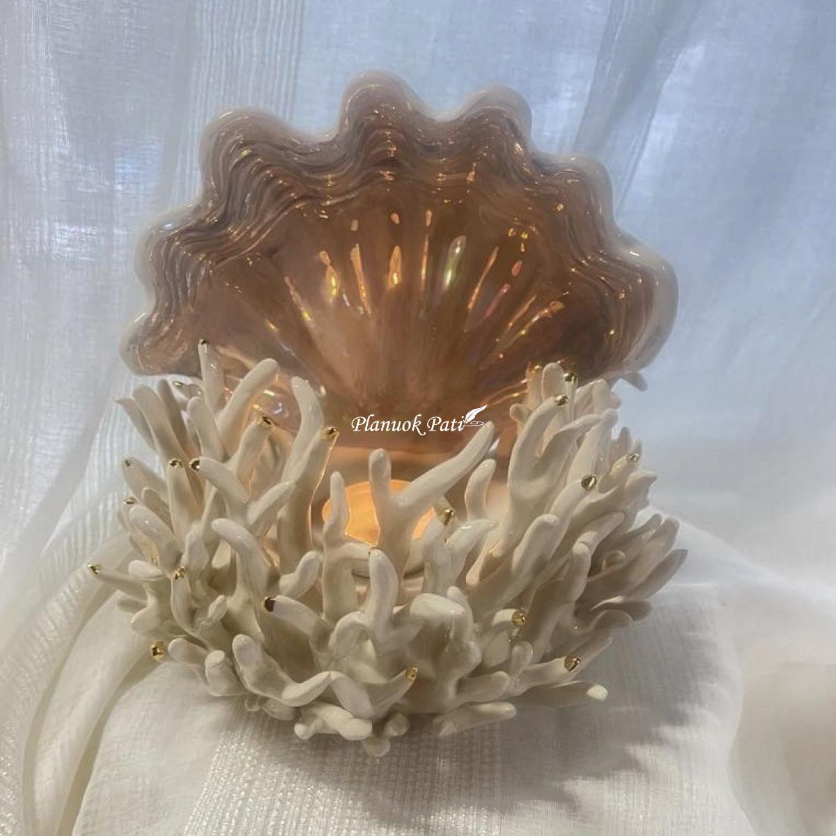 Šeimos židinys - Koralas kriauklėje