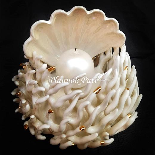 Šeimos židinys - Koralas kriauklėje