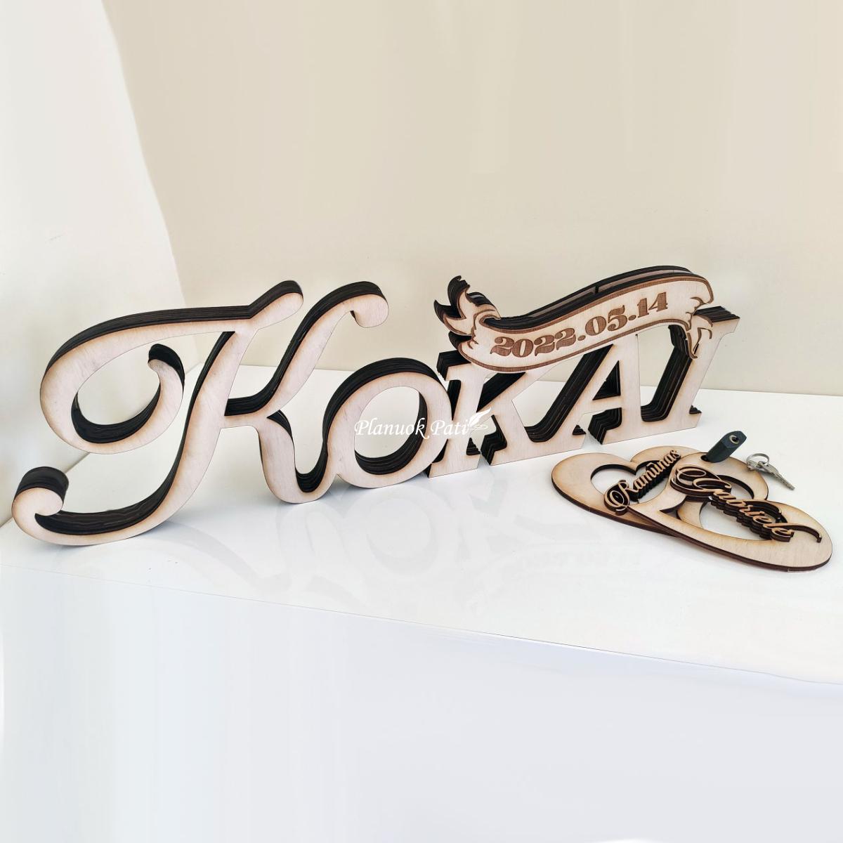 Pastatomas užrašas su surakintomis širdimis