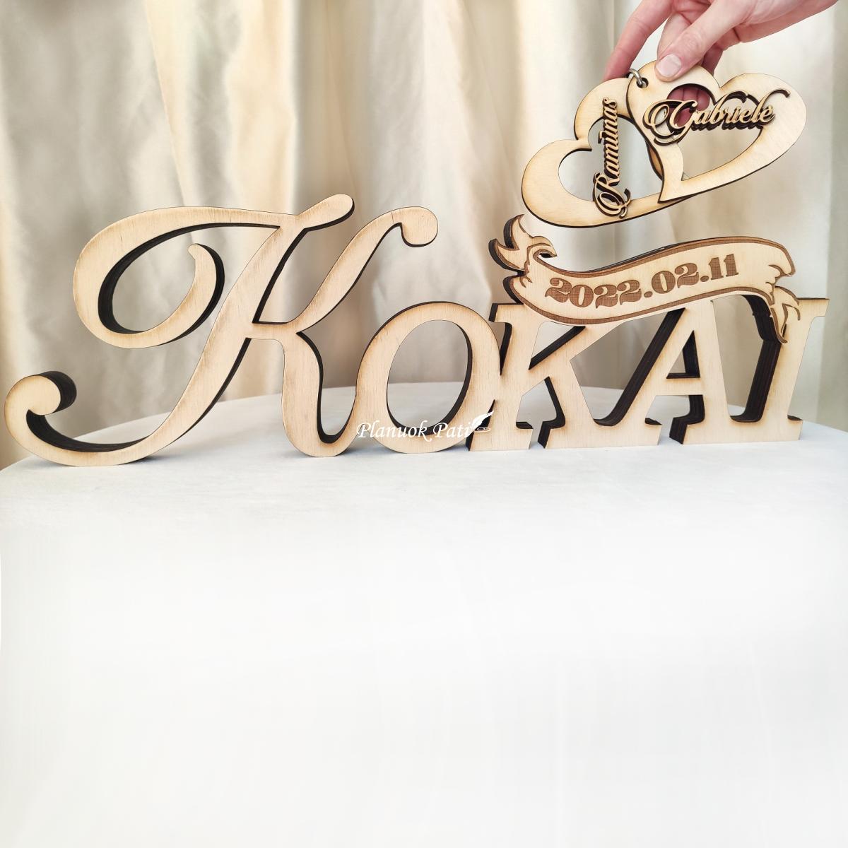 Pastatomas užrašas su surakintomis širdimis