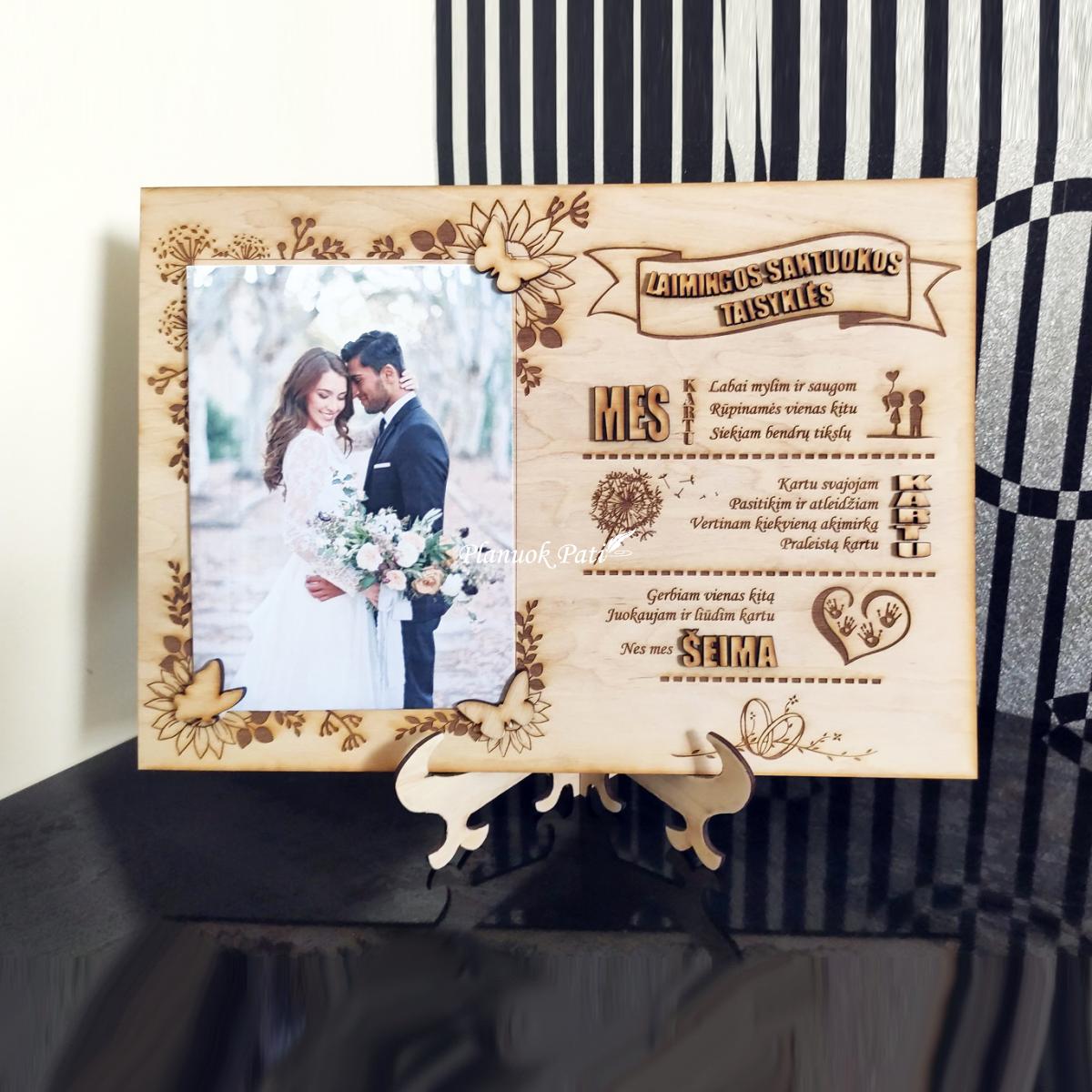 Rėmelis su laimingos santuokos taisyklėmis