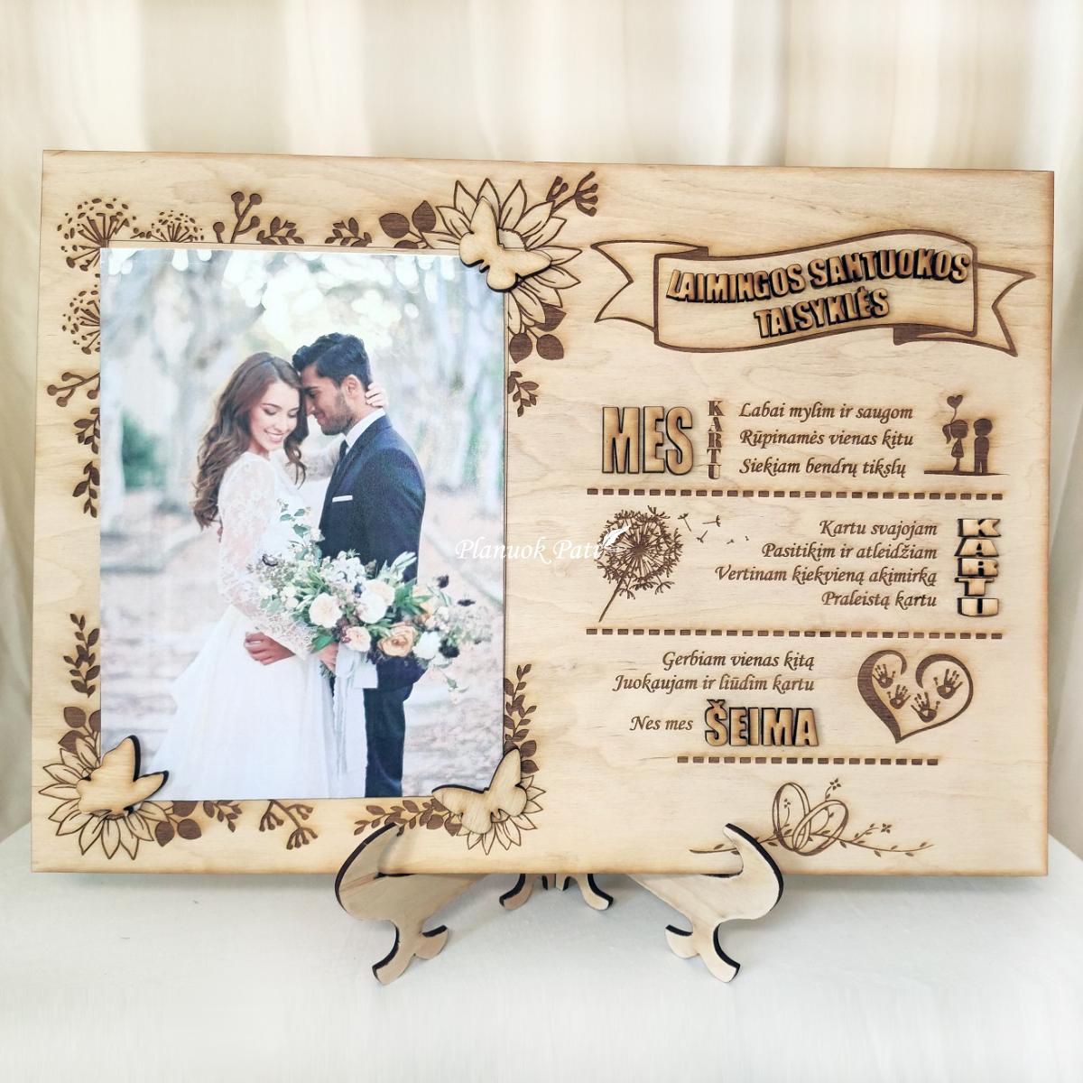 Rėmelis su laimingos santuokos taisyklėmis