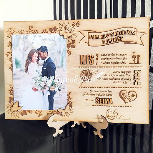 Rėmelis su laimingos santuokos taisyklėmis