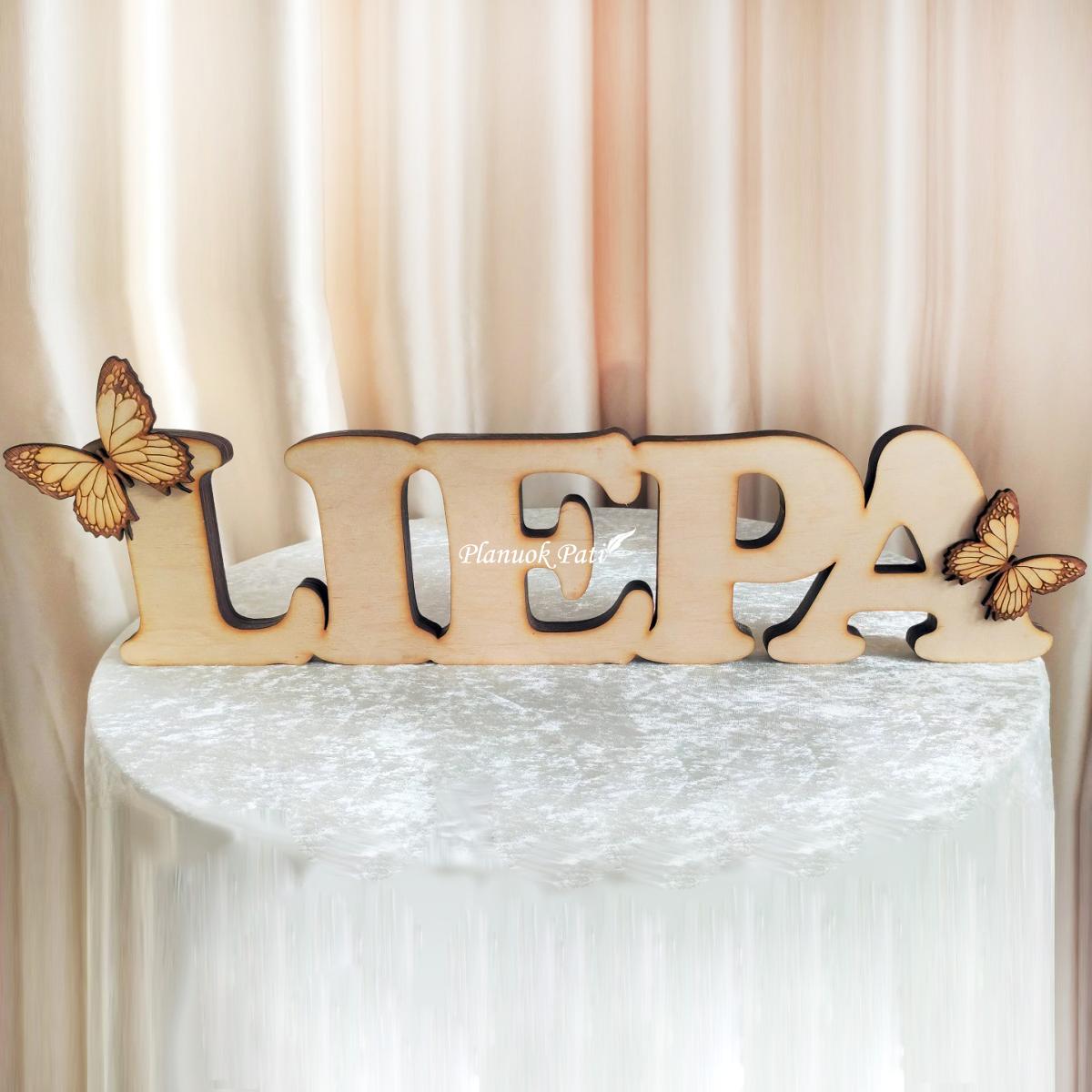 Pastatomas žodis (dekoruotas)